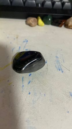 smooth black and grey rock