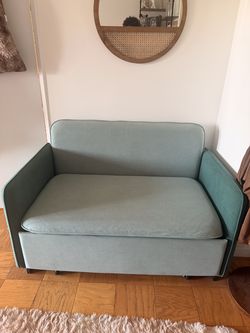 Teal 53.5’’ Convertible 3-in-1 Loveseat with storage underneath.