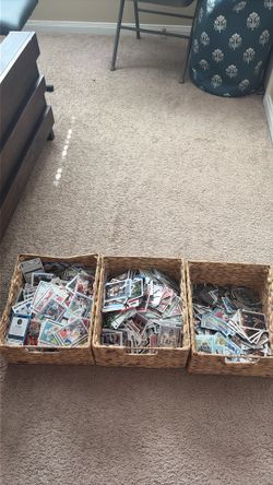 3 boxes of football and basketball cards
