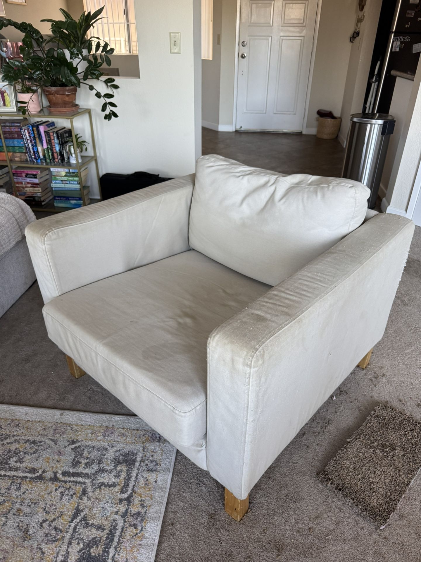 beige arm chair
