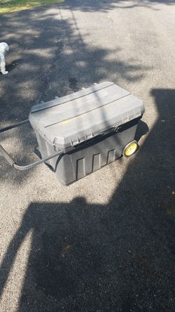 Storage tote with handles and wheels