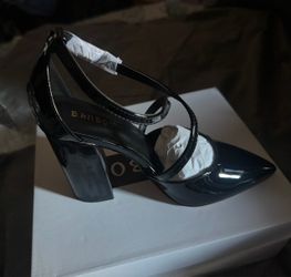 Female black patent leather heels