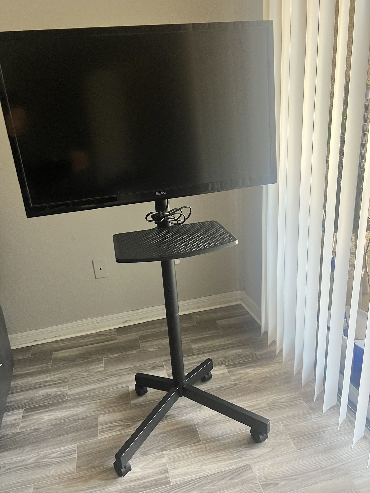 Tv With Rolling Mount