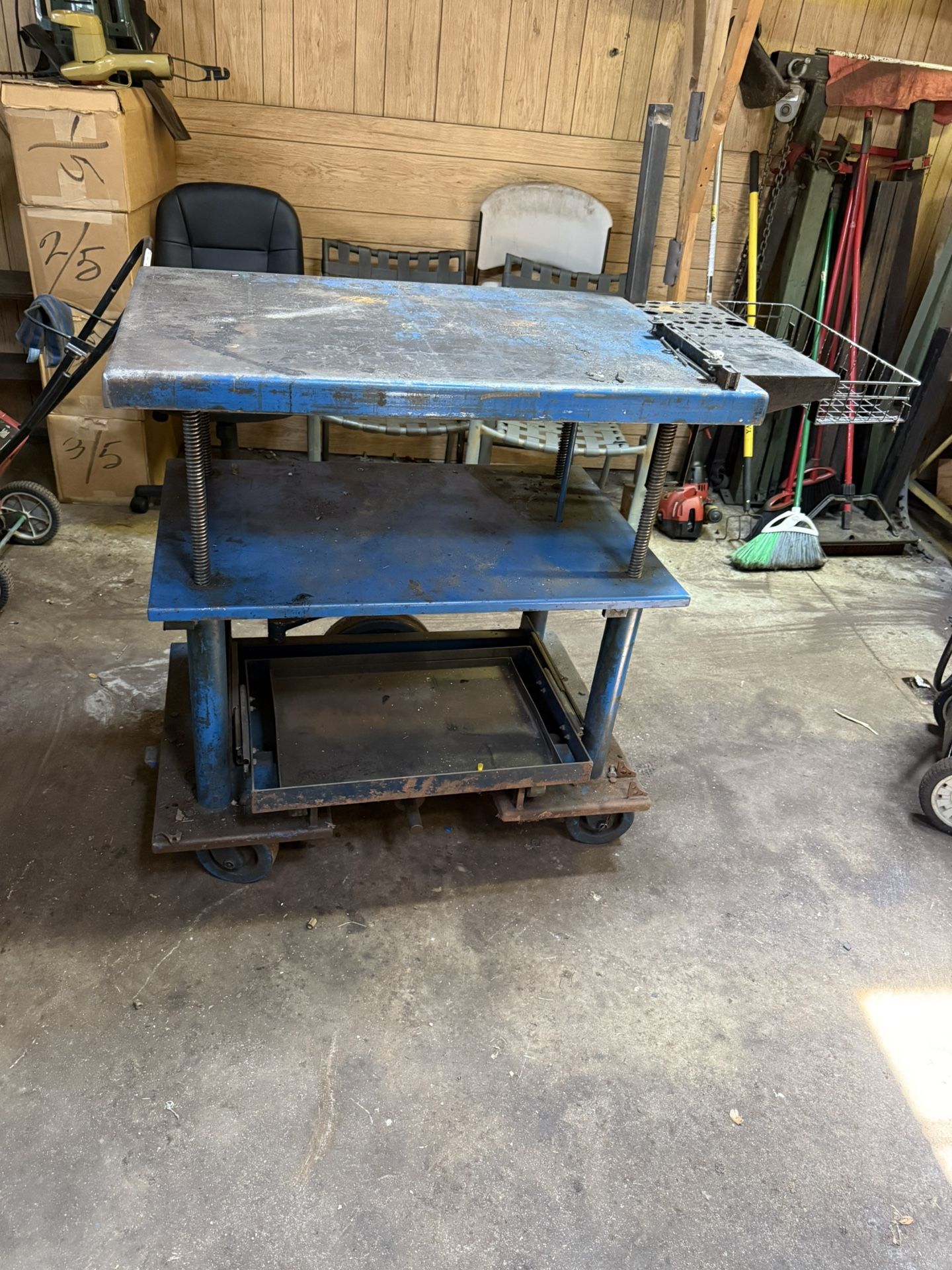 HEAVY DUTY METAL CART ,IT HAS ONE SLIDING SHELF. THE HIGHT IS ADJUSTABLE. $150.00 OR BEST OFFER.