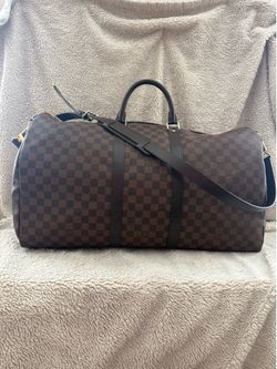 LV Keepall Bandoulier $1800