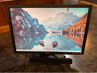 Dell E228WFPc 22” monitor and sound bar. VGA and DVI ports.