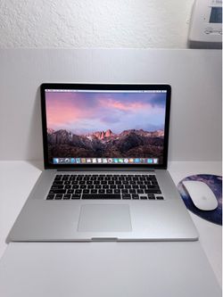 MacBook Pro Retina, 15-inch 256 GB SSD 8 GB RAM $150 Firm