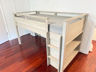 Pottery Barn teen twin loft bed with book shelf.