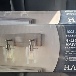 Hampton Bay

Regan 29.13 in. 4-Light
Brushed Nickel Bathroom
Vanity Light with Clear Glass
Shades