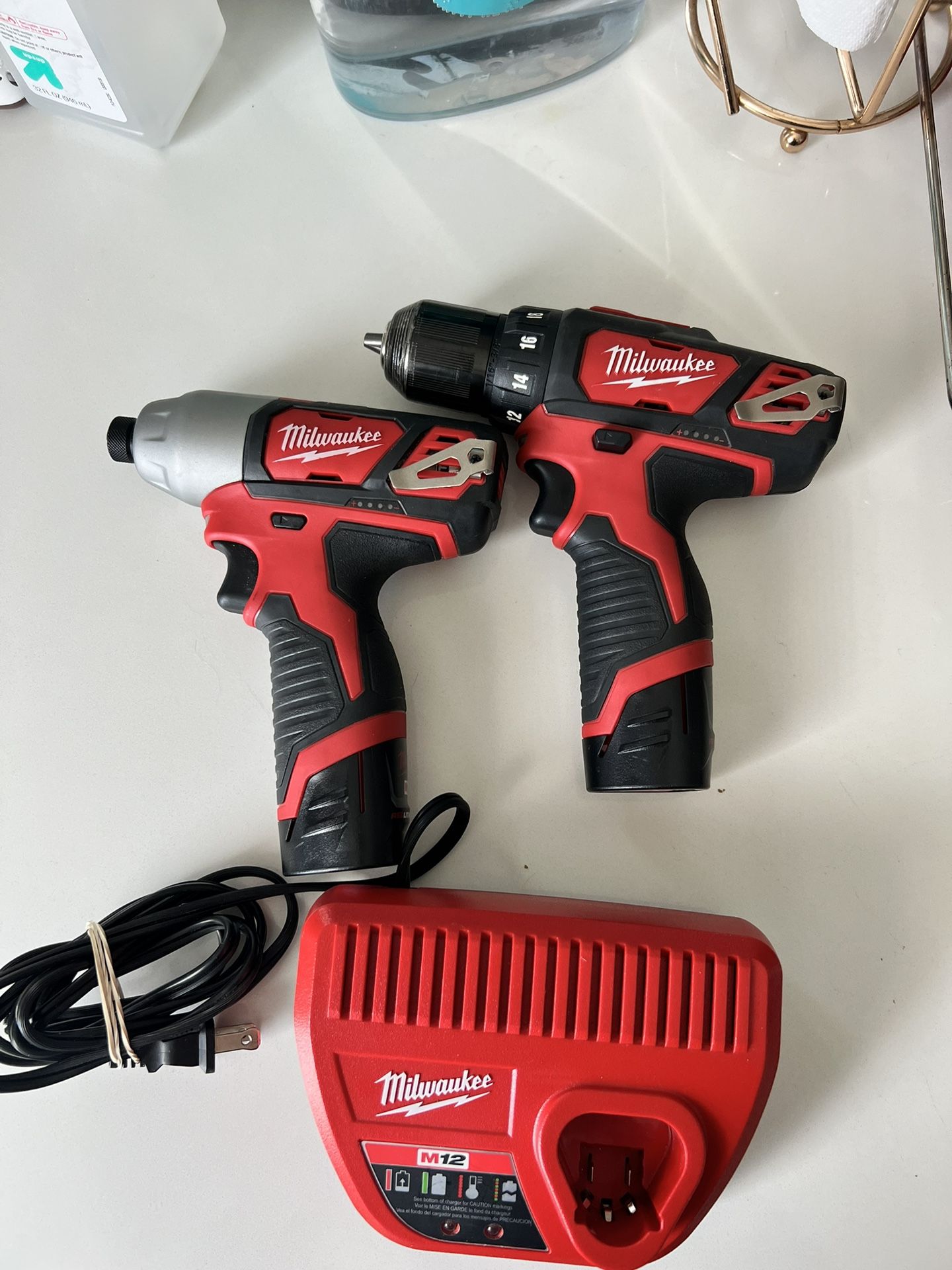 Milwaukee M12 Drill And Impact Driver Bundle with 2 batteries and Charger Bundle.