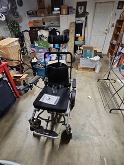 Power Wheelchair with Headrest and Armrests