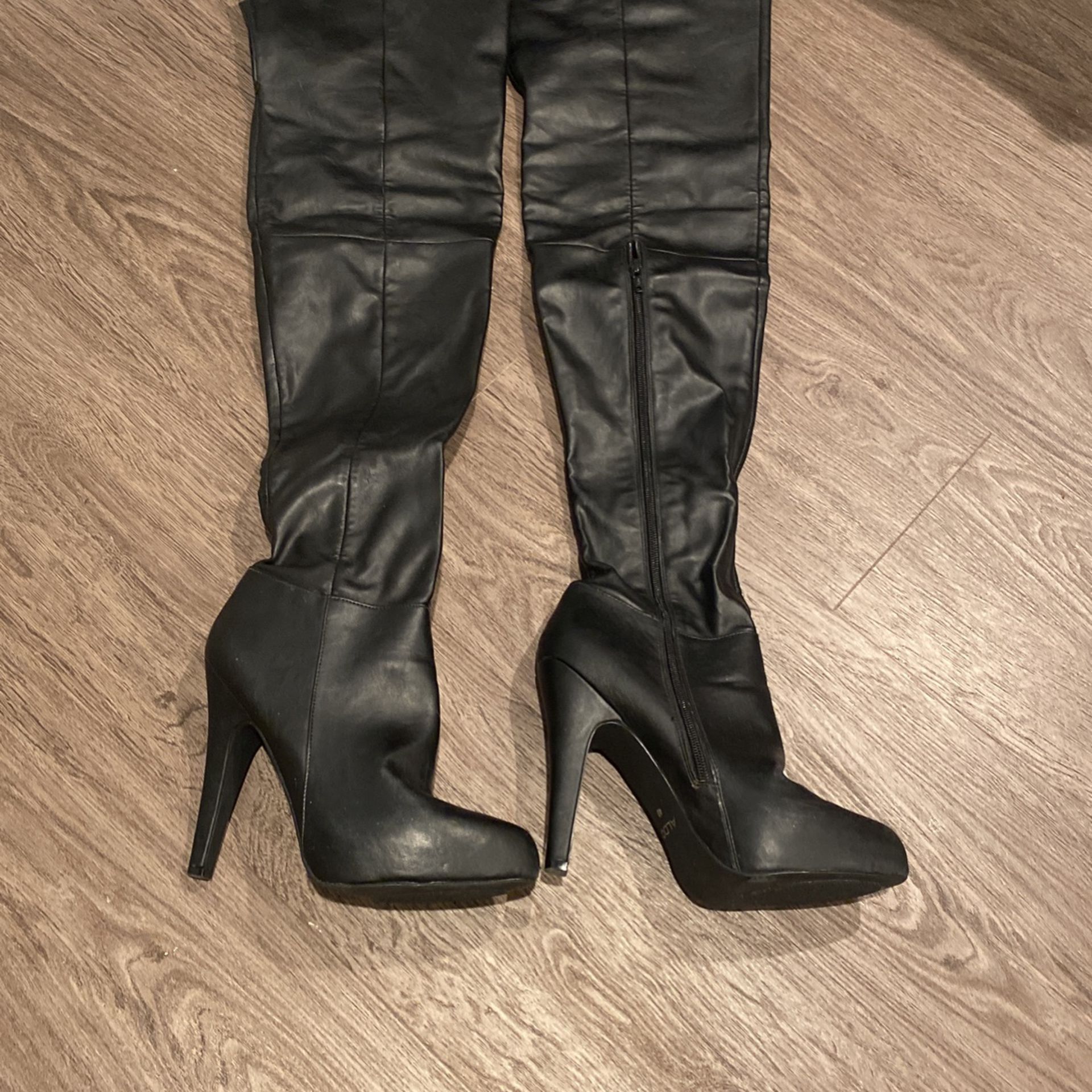 Above Knee Black Boots. 