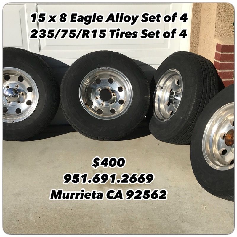15x8 Eagle Alloy Aluminum Wheels + 235/75/15 Tires + Center Caps 4x4 4wd Truck Tires