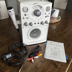 Singing Machine SML385UW  CD G MP3 G Bluetooth Portable Karaoke player System with booklet Microphone cords LIKE NEW Used only a few times WORKS GREAT