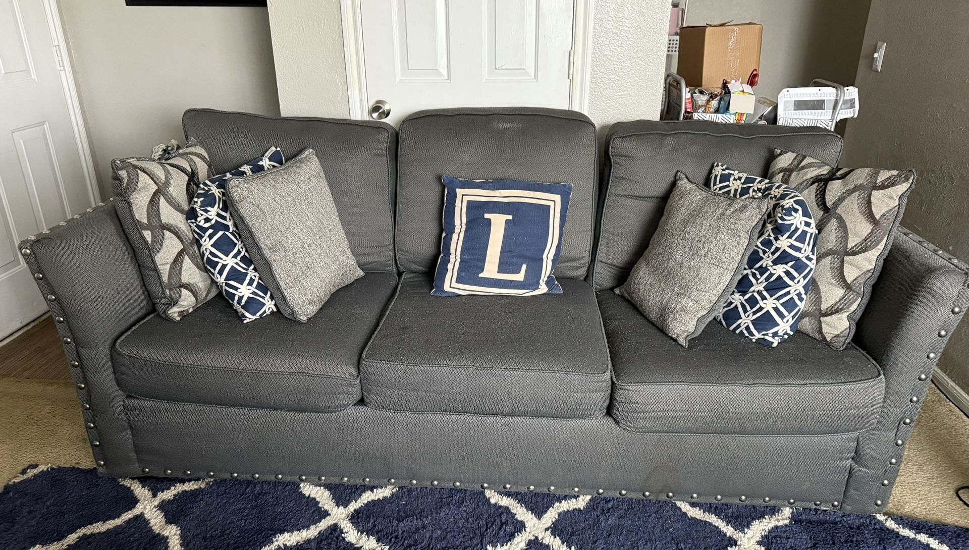 Two Grey Couches with Accent Pillows