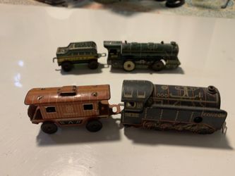 1950s Small Wind Up Trains