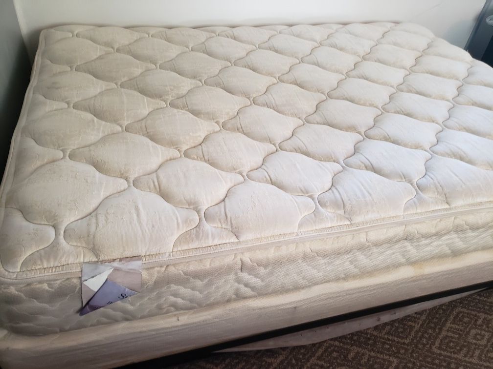 Free full size mattress, box spring and rail.