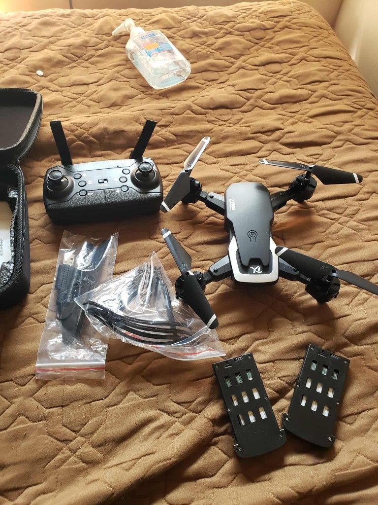 Brand New Drone With 2 Battery, 1 Controller. & all You See For $120!. I don't sell to crackheads. Firm Price. Trade are welcome all work 100%