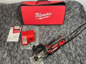 Milwaukee Cordless 2-Speed Grease Gun with battery & Charger Like New