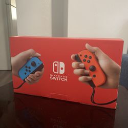 NINTENDO SWITCH WITH EXTRA CONTROLLER SUPER SMASH BROS & SUPER MARIO PARTY INCLUDED !