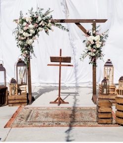 Rustic wood wedding arch