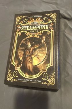 The steampunk tarot, by Barbara Moore and Illustrated by Aly Fell.