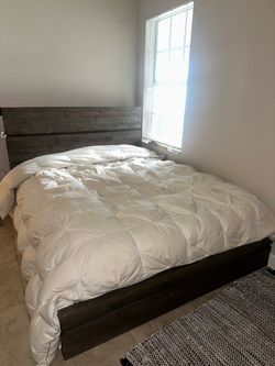 Rustic queen-sized platform bed frame