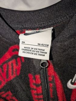 Nike onesie