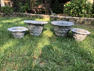 Concrete pots 13”tall 20”round big pots.small pots 8”tall 14”round bigger pot $35each small pots $20each.
