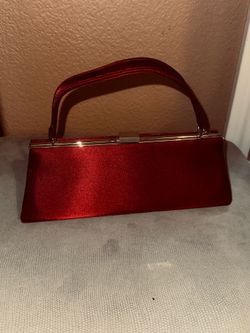 Red satin clutch handbag