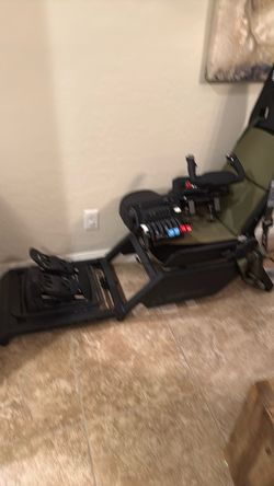 Boeing flight sim chair by next level racing.   Includes controls, yoke, rudders,