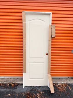 30 in. x 80 in. 2 Panel Left-Handed Primed Composite Solid Core Single Prehung Interior Door 4-9/16 in. Flat Jamb