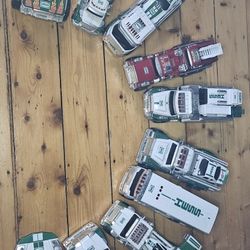 About 12 Hess trucks out of box.