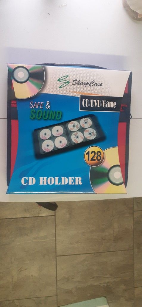 128 DVD / CD / GAME HOLDER AND 300 PICTURE HOLDER BOOKS