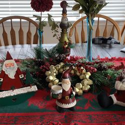 Christmas table display Selling the whole display which includes: All 4 Santa figures The half Christmas reef The golden metal bells If you’d like