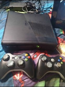 Xbox 360 console with games, $130 firm