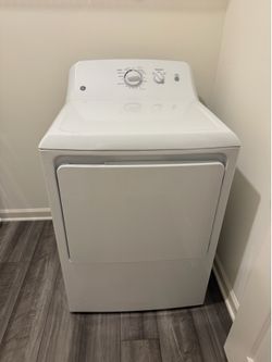 BRAND NEW- GE top load washer and dryer set