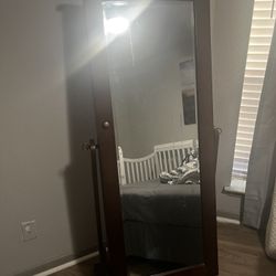 Full-length wooden standing mirror with built-in jewelry organizer