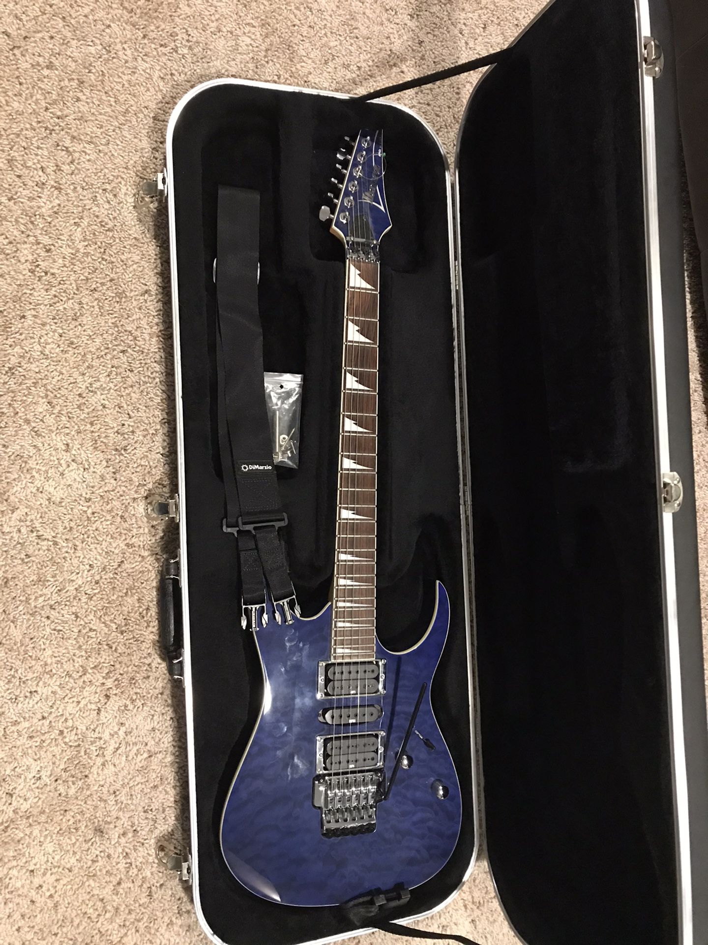 Ibanez RG4EX1 electric guitar with DiMarzio guitar strap and Road Runner hard shell case