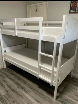 Twin over twin bunk bed. White or espresso. Assembly required. Assembly not included. Taxes included. Free delivery.  Bunk Bed only without Assembly-$