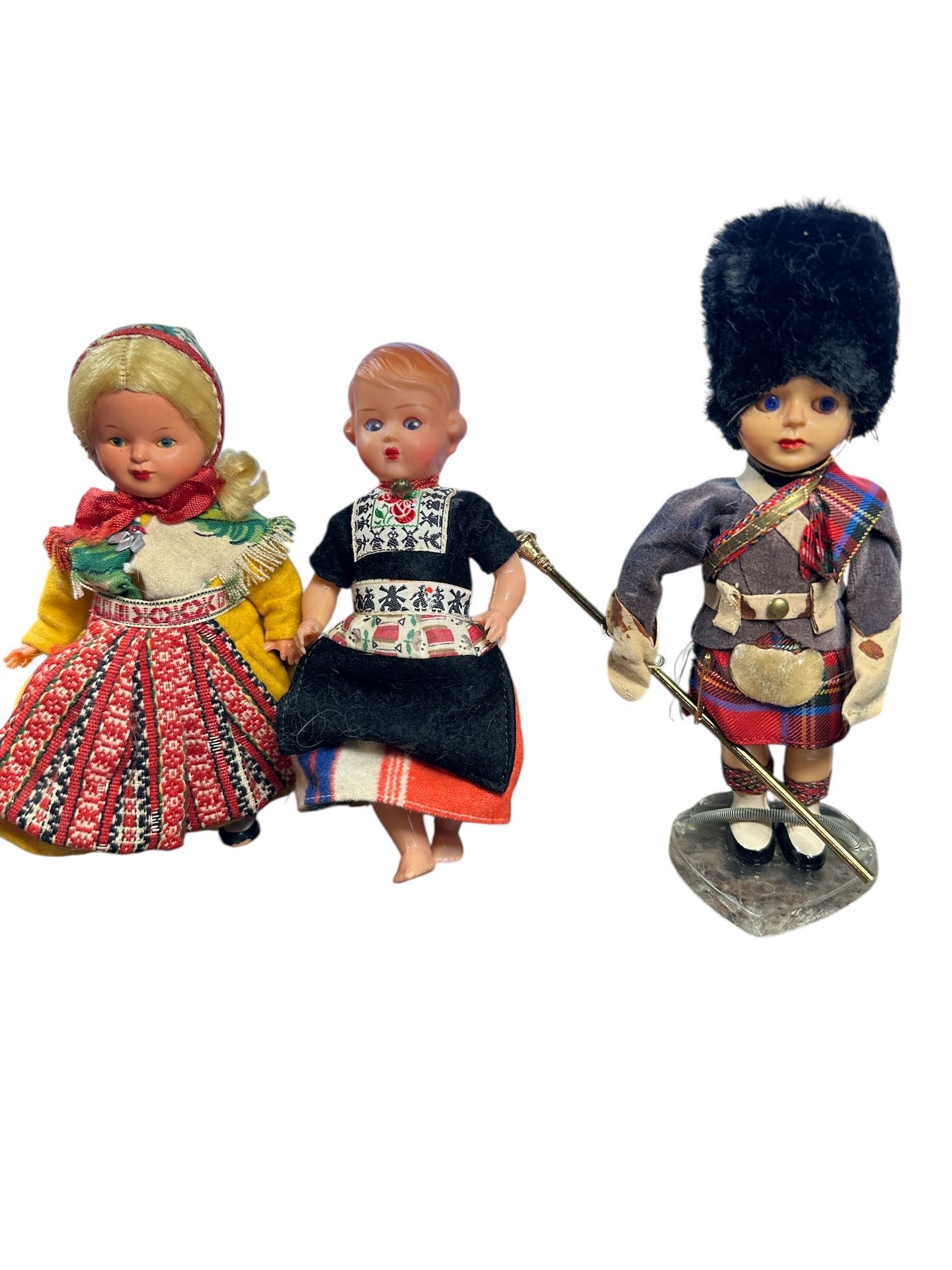 Vintage Dutch Girl" doll, likely from the mid-20th century, vintage 1960s Scottish boy doll and vintage Swedish doll from the 1970s, specifically most