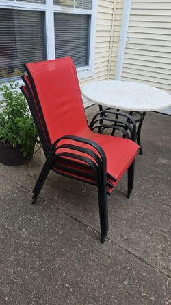 4 red slingback chairs