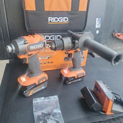 RIDGID 18V BRUSHLESS CORDLESS 2-TOOL COMBO KIT WITH HAMMER DRILL AND IMPACT DRIVER (2) BATTERIES AND CHARGER INCLUDED AND SOFT BAG 