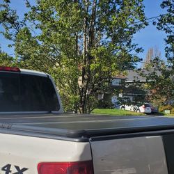 Hard Solid Tri-Fold Tonneau Cover Compatible with 04-15 Nissan Titan