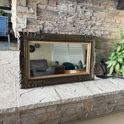 Antique wooden ornate mirror frame with gold details