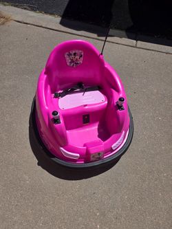 Mickey Mouse driving car for children. Working