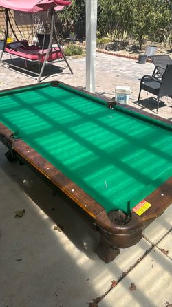 Used pool table with marbles