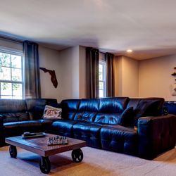 Z-Gallerie Five Piece Black Leather Sectional - with three recliners