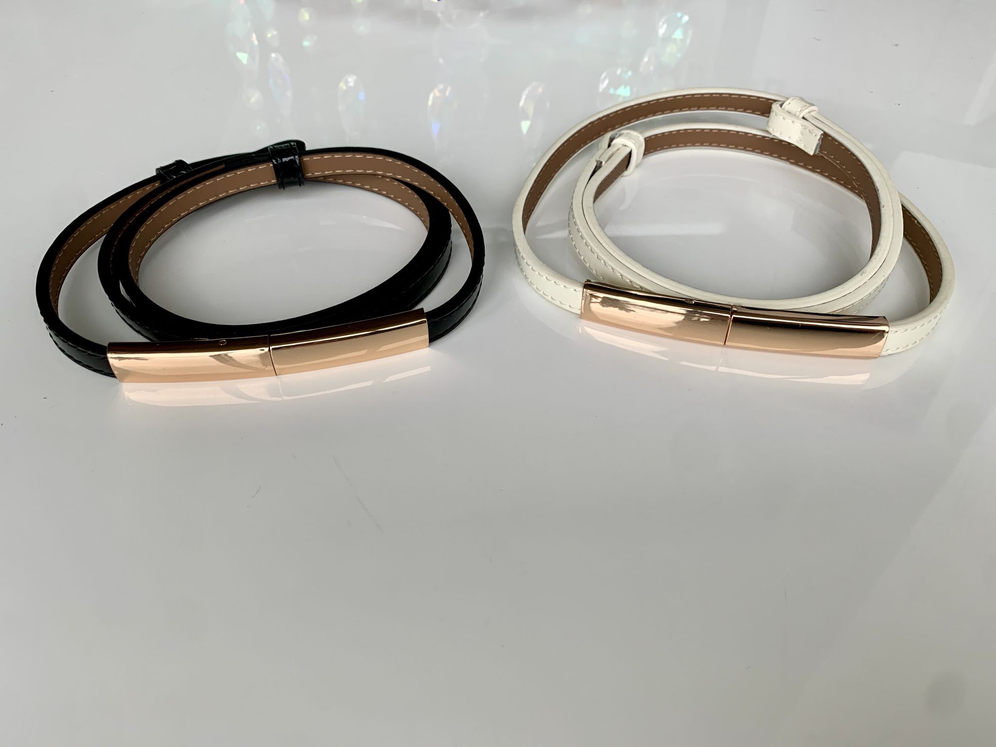 Like New, Two Thin Belts, Black and White with Gold Hardware, Adjustable Size XS, Small to Medium
