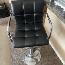 Three Black Swivel Stools 